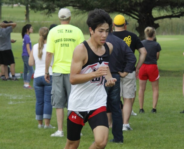 Ren Heimer of West Fork heads toward the finish line during the RL Invitational hosted by Belmond-Klemme last week. Heimer was fourth overall and the Warhawks earned their second team title. (Andrew Shaw/Mid-America Publishing)