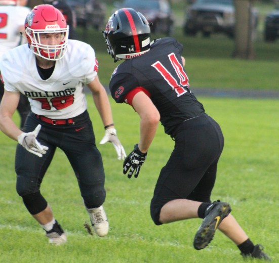 Bulldog defensive back Ozzy Johnstone keeps an eye on CGD's Bryce Allen during this non-district game at Clarion. (Les Houser/Mid-America Publishing)